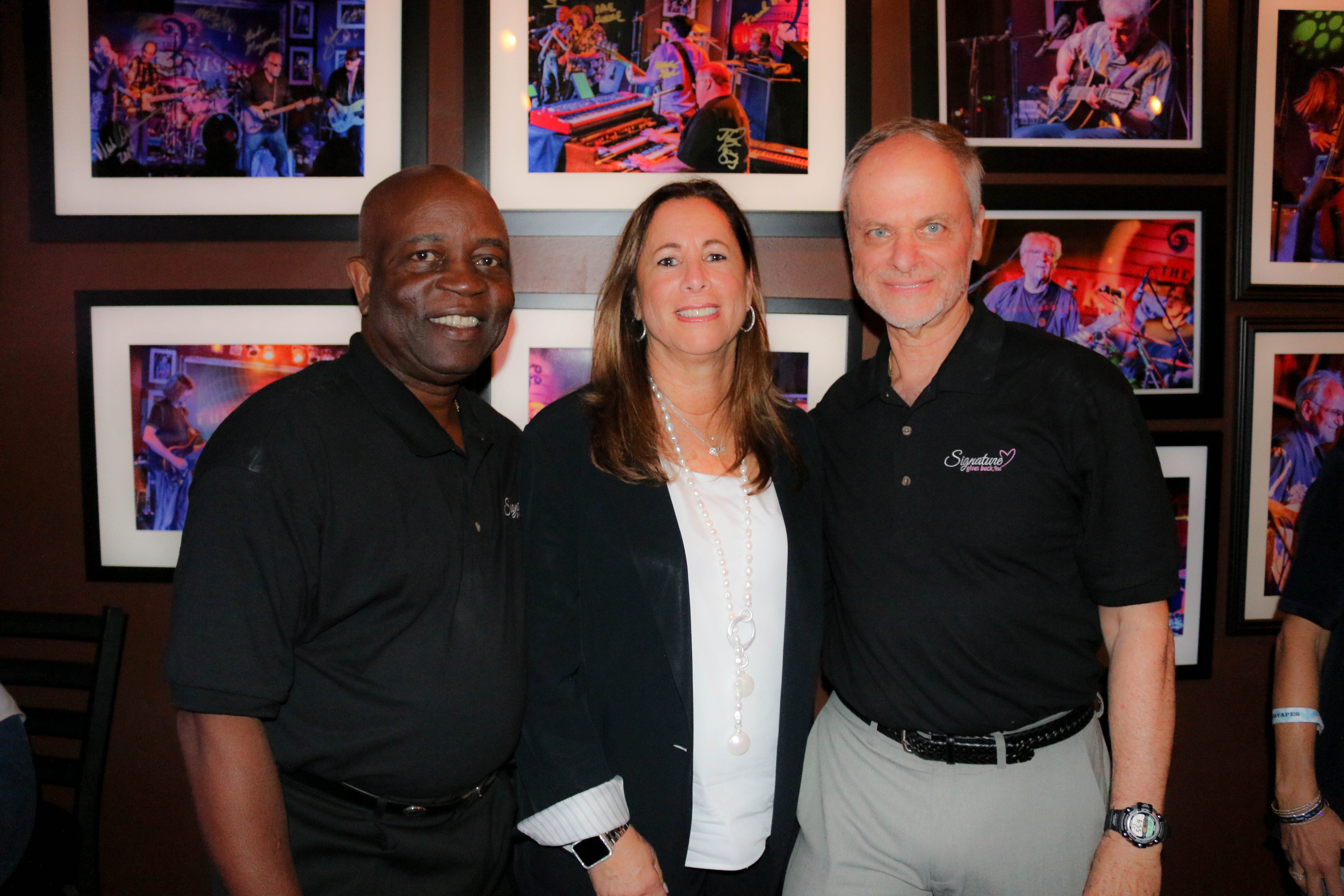 Ivan M. Benjamin, Jr., Wendy Pressner, and Guest of Honor, Jack Jaiven of Signature Gives Back, Inc.